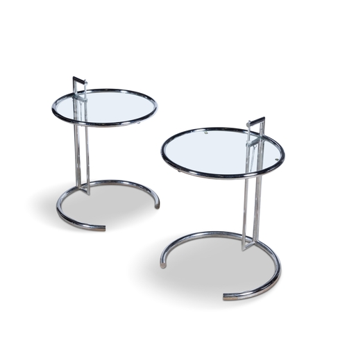 11 - EILEEN GRAY (1878-1976)  A pair of E1027 adjustable side tables by Eileen Gray. Chrome with glass to... 