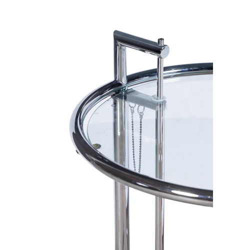 11 - EILEEN GRAY (1878-1976)  A pair of E1027 adjustable side tables by Eileen Gray. Chrome with glass to... 