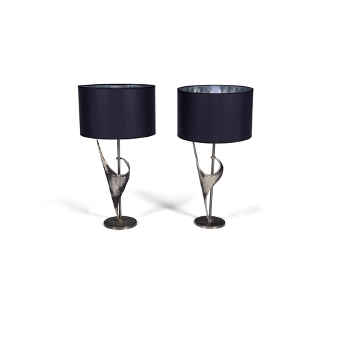 130 - BANCI  A pair of metal table lamps by Banci, Florence. 77cm (h).