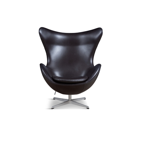 17 - ARNE JACOBSEN (1902-1971)  An 'Egg Chair' with footstool by Arne Jacobsen for Fritz Hansen, upholste... 