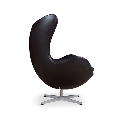 17 - ARNE JACOBSEN (1902-1971)  An 'Egg Chair' with footstool by Arne Jacobsen for Fritz Hansen, upholste... 