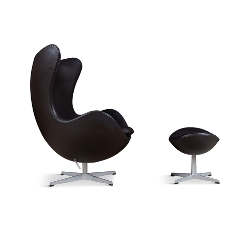17 - ARNE JACOBSEN (1902-1971)  An 'Egg Chair' with footstool by Arne Jacobsen for Fritz Hansen, upholste... 