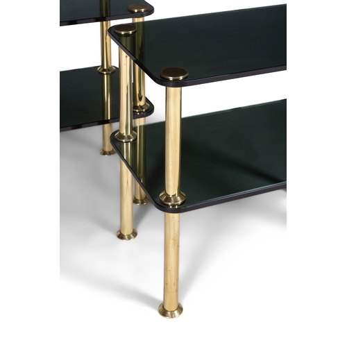 170 - SIDE TABLE  A pair of two-tier gilt metal side tables with smoked glass tops. Italy, c.1980. 55 ... 