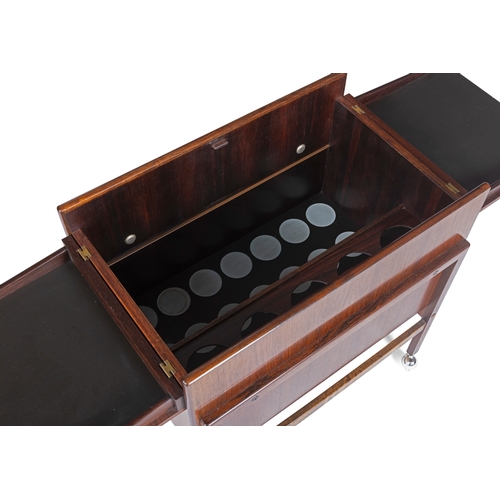 173 - ANDREAS HANSEN (B.1936)  A rosewood drinks car by Andreas Hansen for Areebo Møbler. Denmark, c.... 