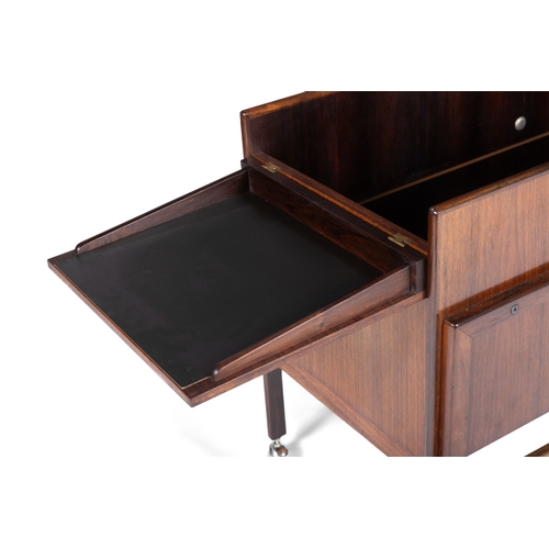 173 - ANDREAS HANSEN (B.1936)  A rosewood drinks car by Andreas Hansen for Areebo Møbler. Denmark, c.... 