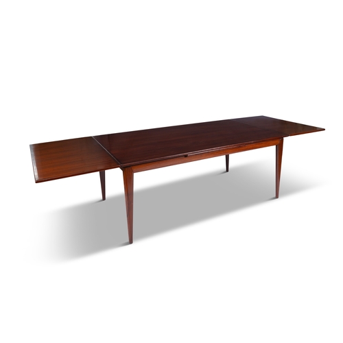 26 - NIELS OTTO MØLLER (1920-1982)  A rosewood extending dining table by Niels Otto Møller. Den... 