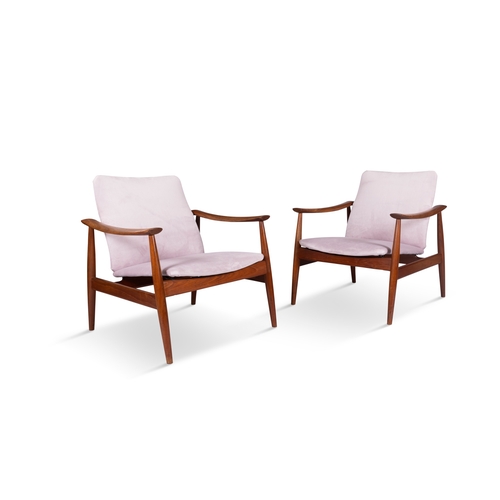 8 - FINN JUHL (1912-1989)  A pair of teak 'Model FD138' armchairs by Finn Juhl. Denmark, c. 1960. With m... 