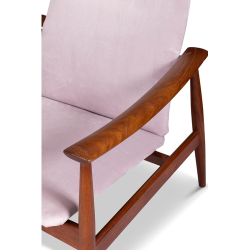 8 - FINN JUHL (1912-1989)  A pair of teak 'Model FD138' armchairs by Finn Juhl. Denmark, c. 1960. With m... 