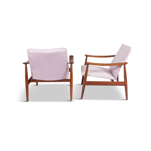 8 - FINN JUHL (1912-1989)  A pair of teak 'Model FD138' armchairs by Finn Juhl. Denmark, c. 1960. With m... 