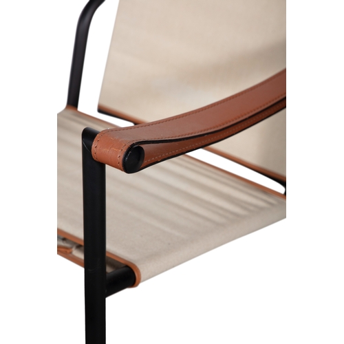 82 - LE CORBUSIER (1887-1965)  A pair of LC1 armchairs by Le Corbusier, brown leather armrests, black chr... 