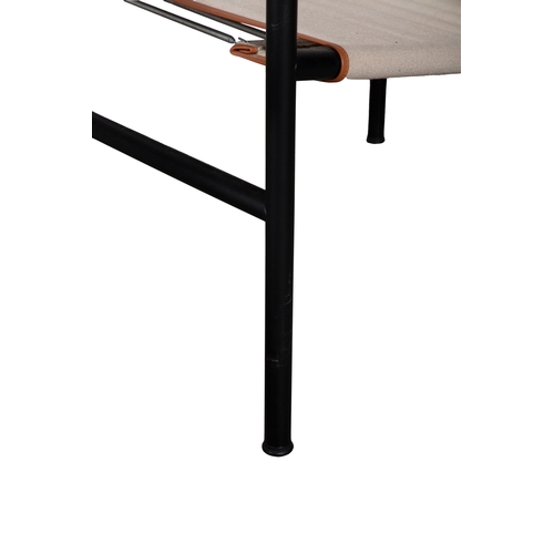 82 - LE CORBUSIER (1887-1965)  A pair of LC1 armchairs by Le Corbusier, brown leather armrests, black chr... 