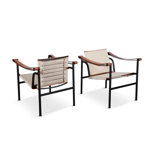 82 - LE CORBUSIER (1887-1965)  A pair of LC1 armchairs by Le Corbusier, brown leather armrests, black chr... 
