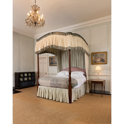 461 - A GEORGE III STYLE MAHOGANY AND POLYCHROME-DECORATED FOUR-POSTER BED,   with fluted front supports, ... 
