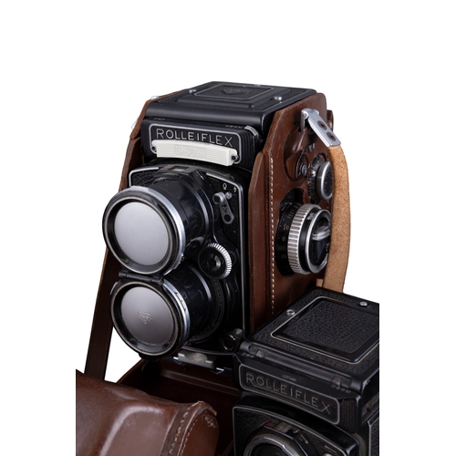 269 - A COLLECTION OF VINTAGE CAMERAS   including  - Three Rolleiflex examples with original cases, includ... 