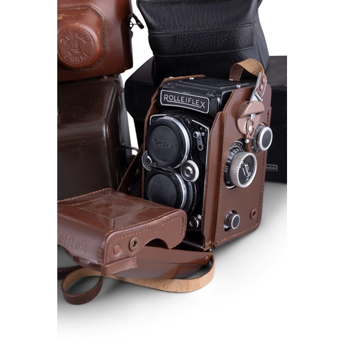 269 - A COLLECTION OF VINTAGE CAMERAS   including  - Three Rolleiflex examples with original cases, includ... 