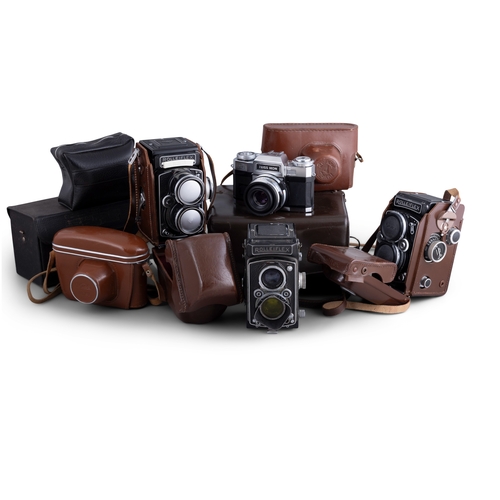 269 - A COLLECTION OF VINTAGE CAMERAS   including  - Three Rolleiflex examples with original cases, includ... 