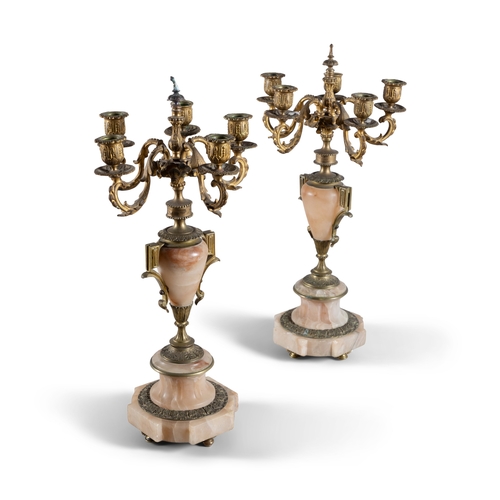 309 - A PAIR OF ALABASTER AND GILT METAL FIVE-LIGHT CANDELABRA, 19TH CENTURY, (E)   each with downswept ac... 