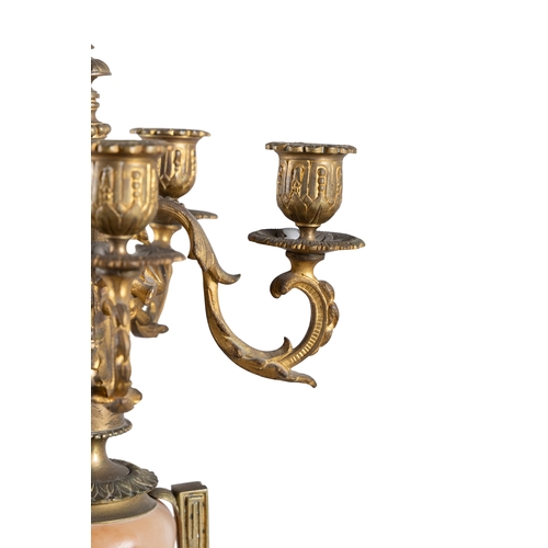 309 - A PAIR OF ALABASTER AND GILT METAL FIVE-LIGHT CANDELABRA, 19TH CENTURY, (E)   each with downswept ac... 