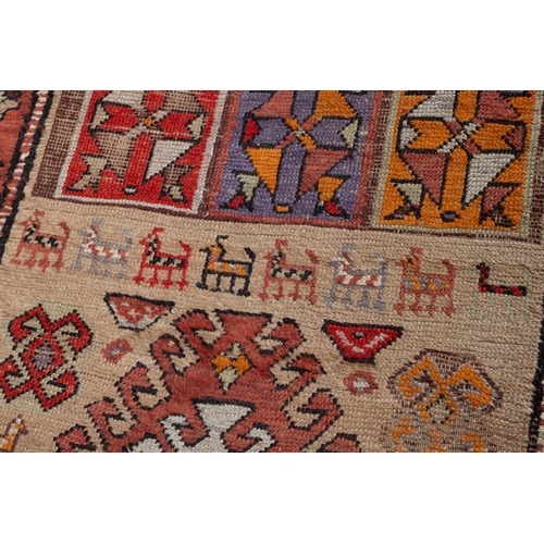 331 - AN ANTIQUE KURDISH WOOL RUNNER,    circa 1890, woven in brick red, terracotta and beige tones, the r... 