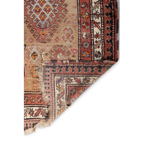 331 - AN ANTIQUE KURDISH WOOL RUNNER,    circa 1890, woven in brick red, terracotta and beige tones, the r... 