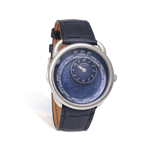 76 - Hermès REF. AR10.510, ARCEAU, LE TEMPS VOYAGEUR, BLUE DIAL An attractive stainless steel world timer... 