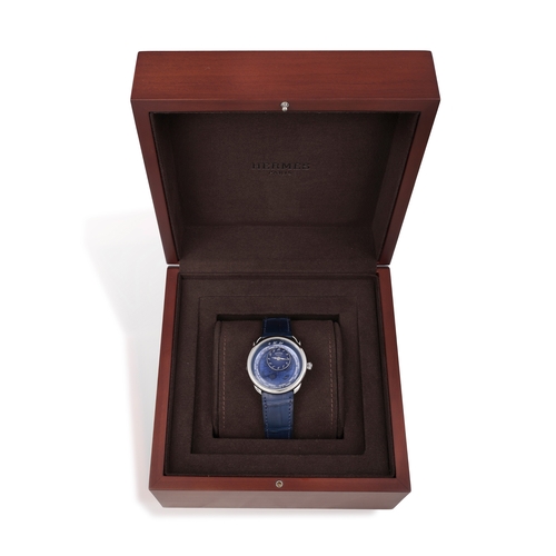 76 - Hermès REF. AR10.510, ARCEAU, LE TEMPS VOYAGEUR, BLUE DIAL An attractive stainless steel world timer... 