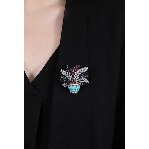 100 - A MULTI-GEM AND DIAMOND FLOWER BASKET BROOCH, CIRCA 1960  Of giardinetto design, the naturalistic sp... 