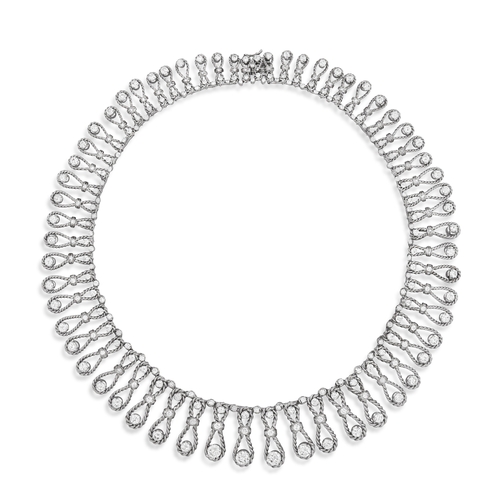 102 - AN IMPORTANT DIAMOND NECKLACE, CIRCA 1960  Of openwork ropetwist design, each loop set with brillian... 