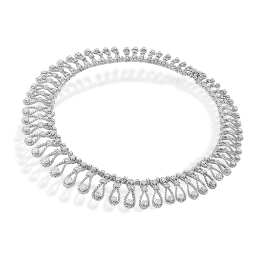 102 - AN IMPORTANT DIAMOND NECKLACE, CIRCA 1960  Of openwork ropetwist design, each loop set with brillian... 