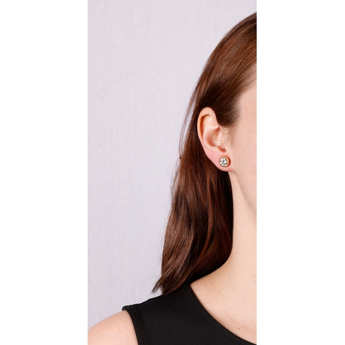 104 - BULGARI: TWO DIAMOND EARSTUDS  The private collection of a Roman Lady (lot 103 to 111)  The first on... 