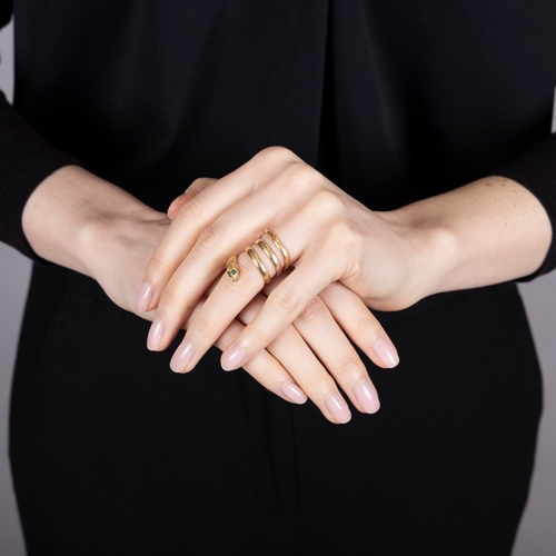 106 - BULGARI: A GOLD AND EMERALD SERPENT RING, CIRCA 1950  The private collection of a Roman Lady (lot 10... 