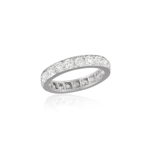 108 - A DIAMOND ETERNITY RING  The private collection of a Roman Lady (lot 103 to 111)  Composed of a cont... 