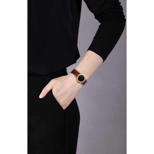 113 - BULGARI: AN 18K GOLD 'BVLGARI BVLGARI' WRISTWATCH, CIRCA 1980  The private collection of a Roman Lad... 