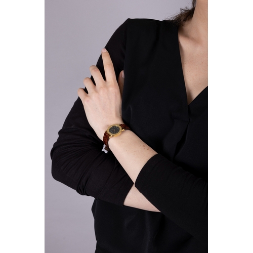113 - BULGARI: AN 18K GOLD 'BVLGARI BVLGARI' WRISTWATCH, CIRCA 1980  The private collection of a Roman Lad... 