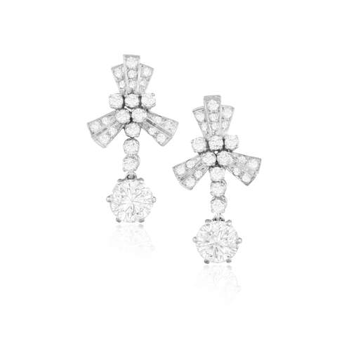 116 - A PAIR OF DIAMOND PENDENT EARRINGS  Each brilliant-cut diamond suspended from a line of brilliant-cu... 