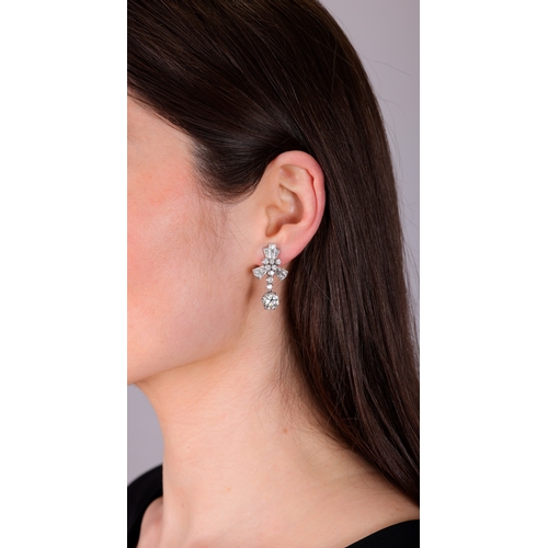 116 - A PAIR OF DIAMOND PENDENT EARRINGS  Each brilliant-cut diamond suspended from a line of brilliant-cu... 