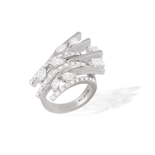 118 - M. & CO.: A RETRO DIAMOND RING, CIRCA 1950  The stepped, fan-shaped mount comprising seven knife-edg... 