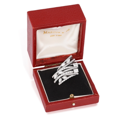 118 - M. & CO.: A RETRO DIAMOND RING, CIRCA 1950  The stepped, fan-shaped mount comprising seven knife-edg... 