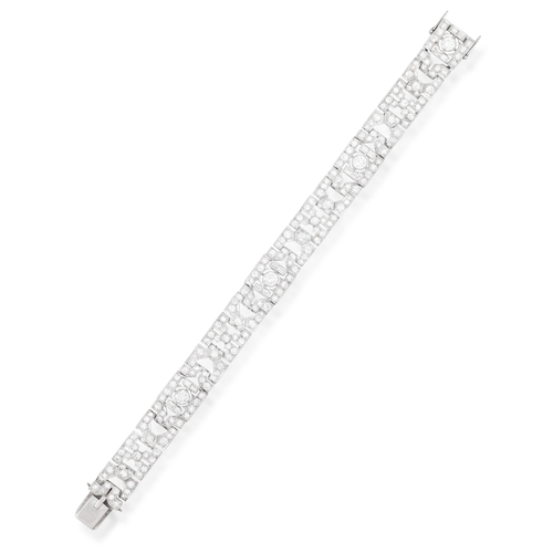 65 - AN ART DECO DIAMOND BRACELET, CIRCA 1930  Of openwork geometric design, set throughout with old Euro... 