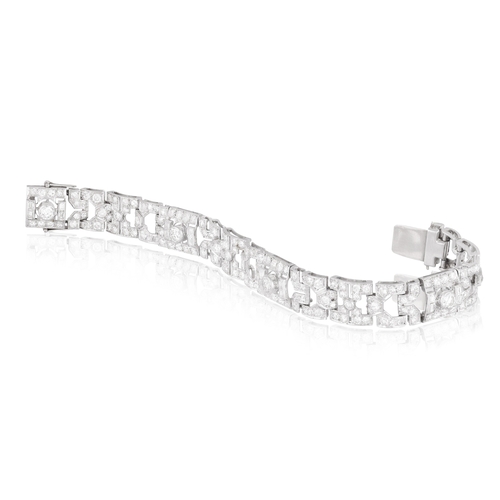 65 - AN ART DECO DIAMOND BRACELET, CIRCA 1930  Of openwork geometric design, set throughout with old Euro... 