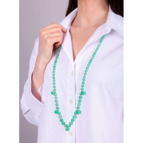 66 - A JADE BEAD SAUTOIR NECKLACE  The single row of graduated jade beads, measuring approximately 9.48mm... 