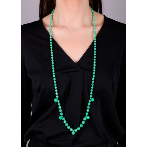 66 - A JADE BEAD SAUTOIR NECKLACE  The single row of graduated jade beads, measuring approximately 9.48mm... 