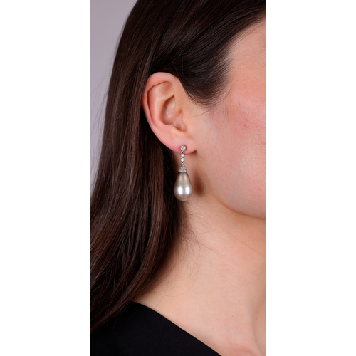 67 - A RARE AND IMPORTANT PAIR OF EARLY 20TH CENTURY PEARL AND DIAMOND PENDENT EARRINGS

The private coll... 