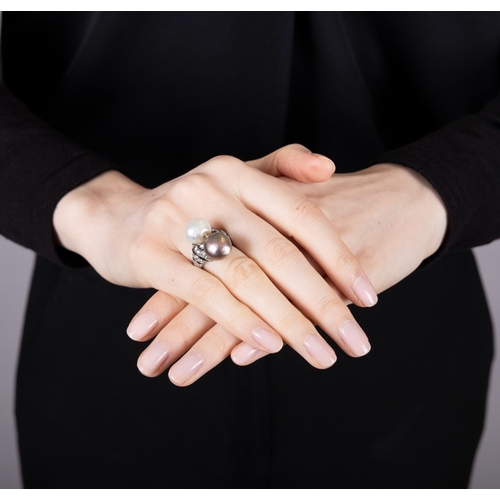 68 - AN EARLY 20TH CENTURY PEARL, ENAMEL AND DIAMOND RING, CIRCA 1920

The private collection of a Contin... 