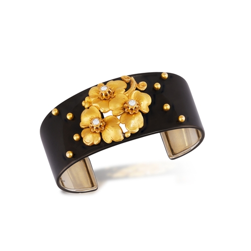 69 - CARTIER: A DIAMOND, LACQUER AND GOLD BANGLE, CIRCA 1910  The private collection of a Continental Lad... 