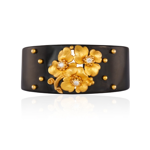 69 - CARTIER: A DIAMOND, LACQUER AND GOLD BANGLE, CIRCA 1910  The private collection of a Continental Lad... 