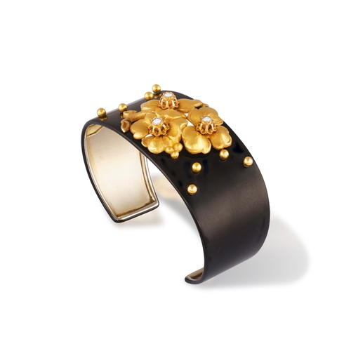 69 - CARTIER: A DIAMOND, LACQUER AND GOLD BANGLE, CIRCA 1910  The private collection of a Continental Lad... 