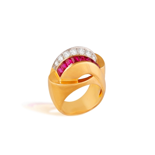 73 - A RETRO RUBY AND DIAMOND TANK RING, FRENCH, CIRCA 1945  The bombé mount designed as two overlapping ... 