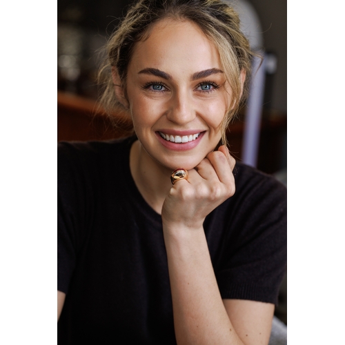 73 - A RETRO RUBY AND DIAMOND TANK RING, FRENCH, CIRCA 1945  The bombé mount designed as two overlapping ... 