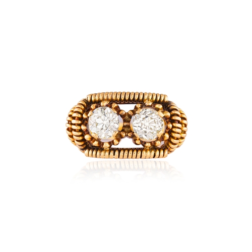 74 - A RETRO DIAMOND TWO-STONE RING, CIRCA 1950  Composed of two old-brilliant-cut diamonds within claw-s... 
